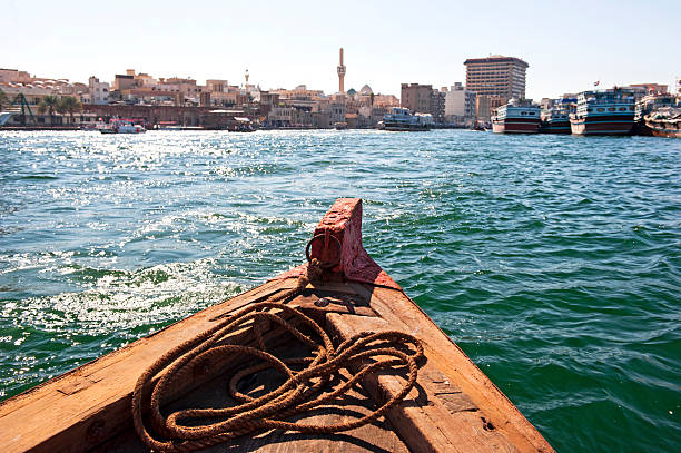 Traditional abra boat crossing Dubai Creek between Deira and Bur Dubai
