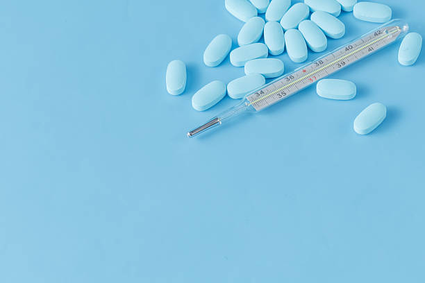 istock Drugs on blue background 506587812