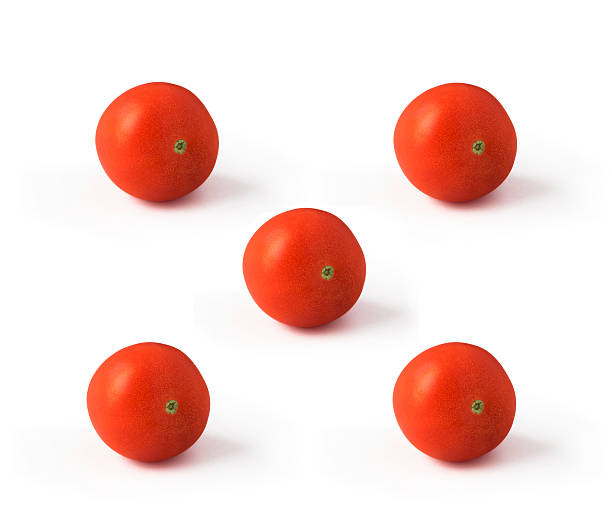 Five tomatoes isolated on white background stock photo