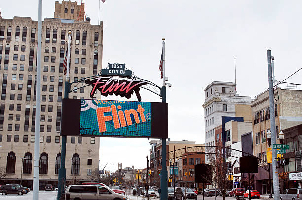 Downtown Flint Michigan Digital Sign Flint, Michigan, USA - January 23, 2016: Downtown Flint, Michigan and it's digital sign welcoming visitors. flint michigan stock pictures, royalty-free photos & images