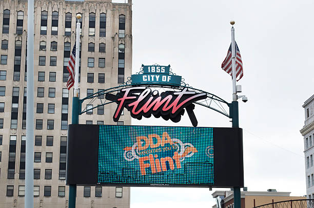Downtown Flint Michigan Digital Sign Flint, Michigan, USA - January 23, 2016: Downtown Flint, Michigan and it's digital sign welcoming visitors. flint michigan stock pictures, royalty-free photos & images