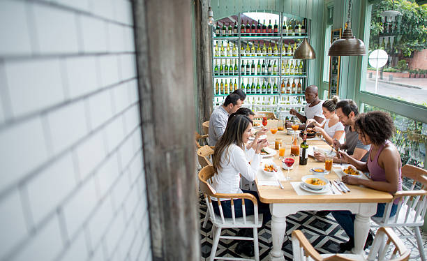 Group of friends eating at a restaurant