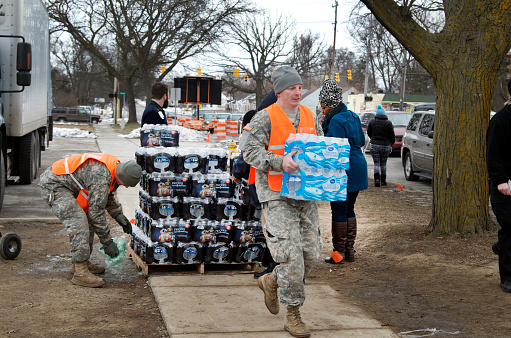 Flint, Michigan, USA - January 23, 2016:National Guard helps to distribute bottled water to the people of Flint.