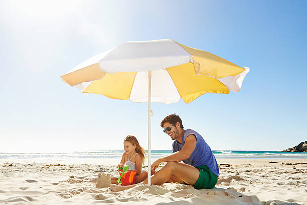istock Spending time with his little girl at the beach 506594915