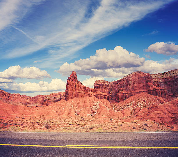 istock Vintage retro stylized scenic road, USA. 506595818