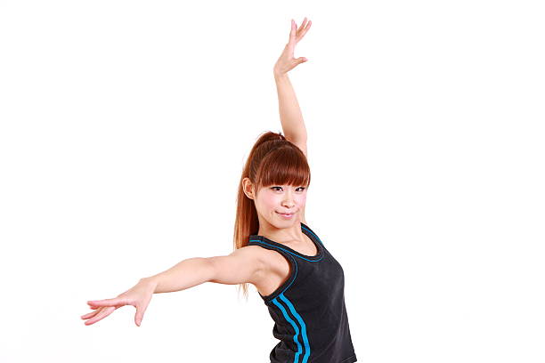 studio shot of young Japanese dancing woman