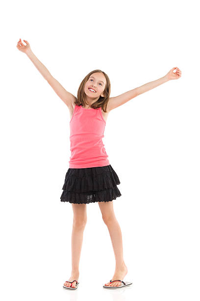 istock Happy girl with arms outstretched 506596671