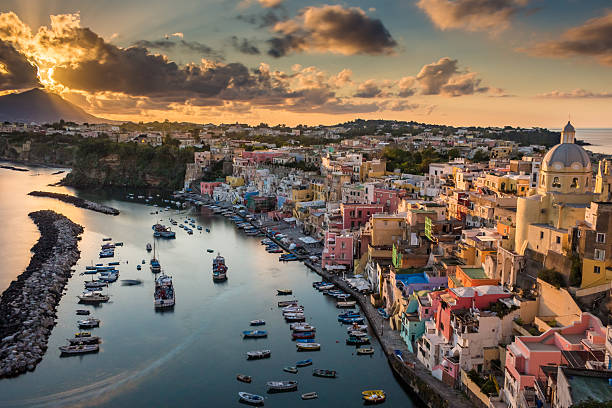 istock Sunset cloudy at harbor Corricella 506598774