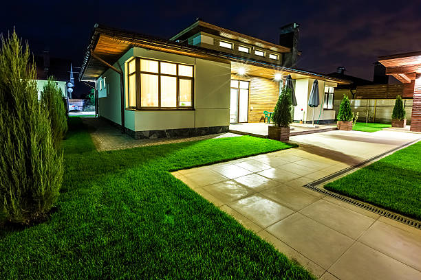 istock Detached house at night view from outside the rear courtyard. 506598836