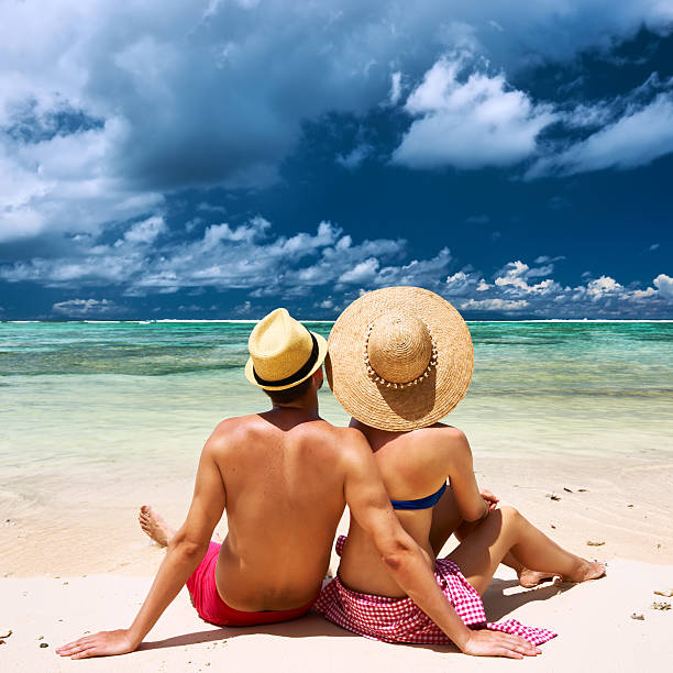 istock Couple on a beach at Seychelles 506599831