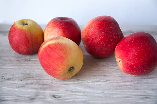 Five ripe apples stock photo