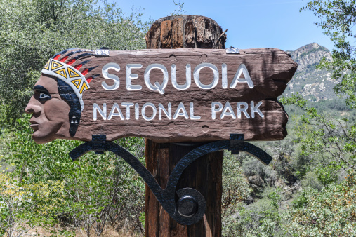 Sign to the entrance of Sequoia National Park, California.