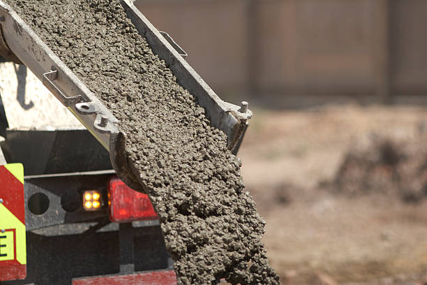 istock Pouring Concrete Into Hole From Lorry 506601635