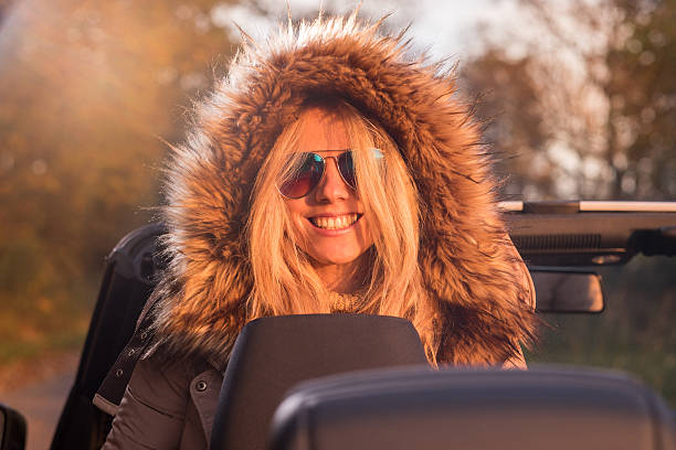 istock Smiling women posing in cabriolet 506603638