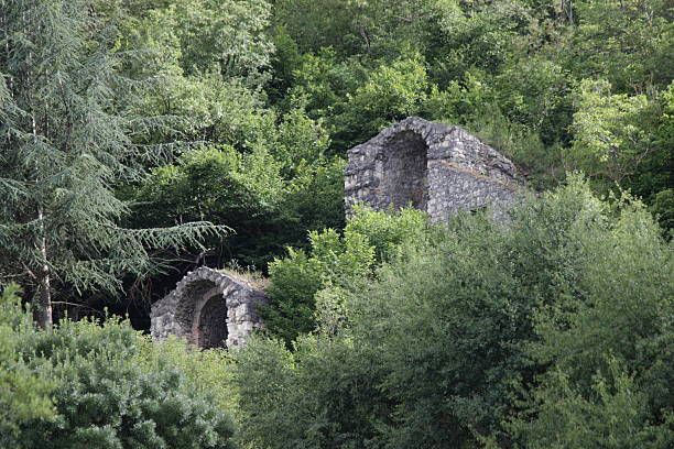 Major Tunnels Avezzano, Abruzzo region, Italy. Among the trees, on the flanks of Mount Salviano you see the descendering shafts of Cunicoli Maggiori, inclined tunnels built by the Romans to allow the evacuation of excavation debris and ventilation during the construction of the tunnel to drain the water of Lake Fucino in the first century AD. avezzano stock pictures, royalty-free photos & images