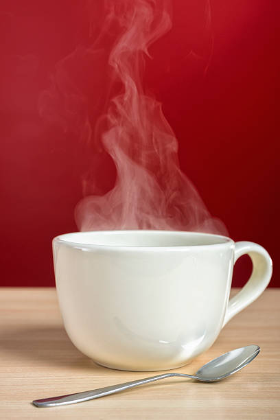 istock Steam rising from a large cup of coffee or tea 506604200