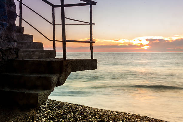 istock Silhouette of a stair on a sea sunset 506605008