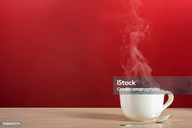 Steamy Rising From A Large Cup Of Coffee Or Tea Stock Photo - Download Image Now - Coffee - Drink, Tea - Hot Drink, Table