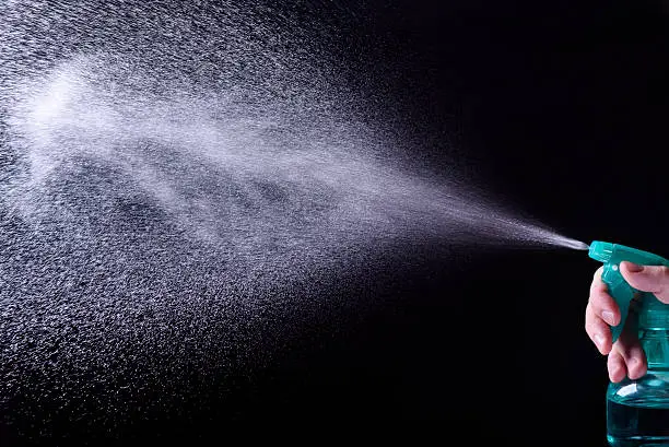 Photo of Spray Bottle with mist visible