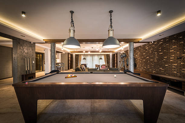 istock Interior of a luxury living room with billiard table 506608932