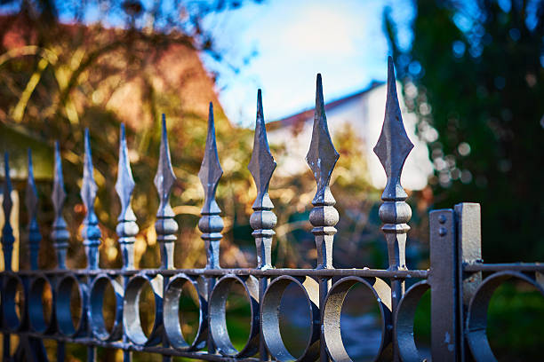 istock terrifying fence with spearheads 506610354