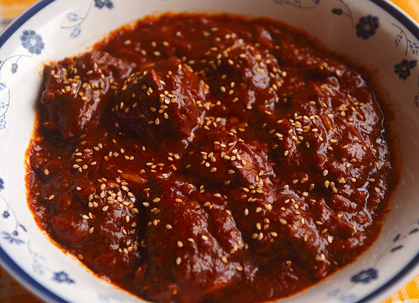 istock Chicken in Mole Poblano sauce. Puebla, Mexico. 506613272