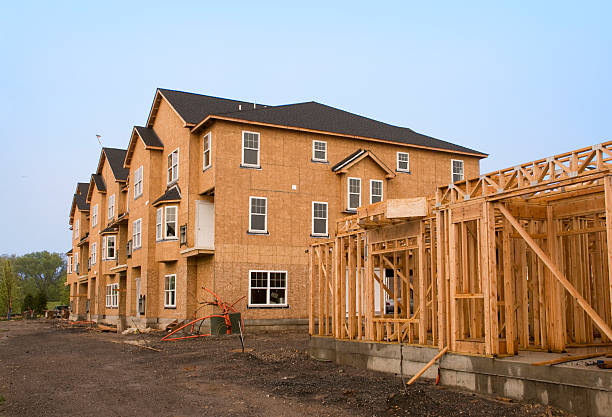 istock Housing under construction in various stages of development 506613576