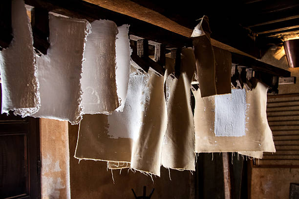 istock Ancient paper mill. Old traditional process of paper production 506614364