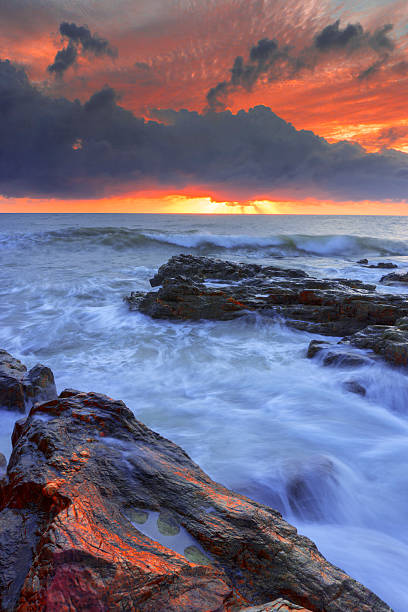 istock Sunrise with wave at Kemasek Beach 506617310