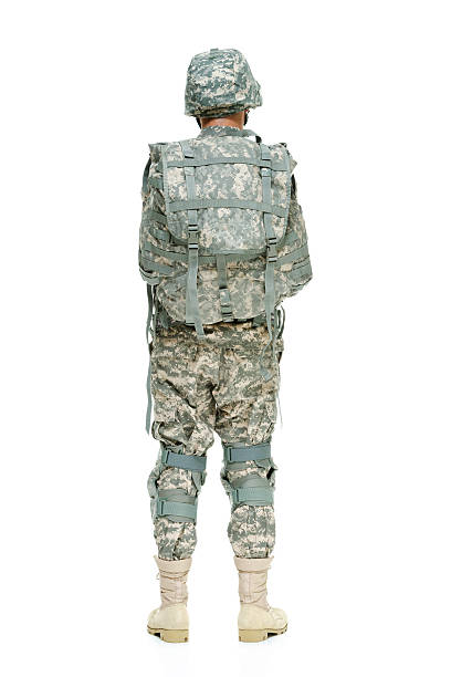 istock Rear view of army man standing 506618590