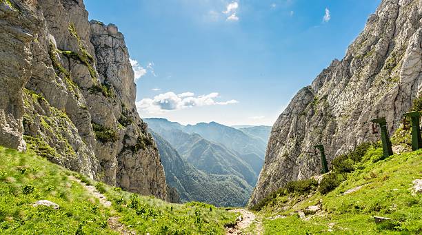 istock Mountain pass with a view of a valley 506620267