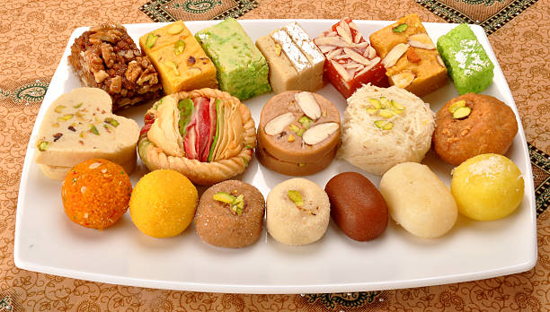 Pakistani Mithai A group of delicious and famous Pakistani and Indian Sweets india sweets stock pictures, royalty-free photos & images