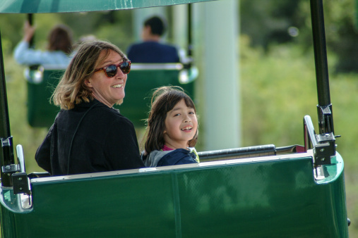 A mother and her daughter ride a sky lift in northern California.