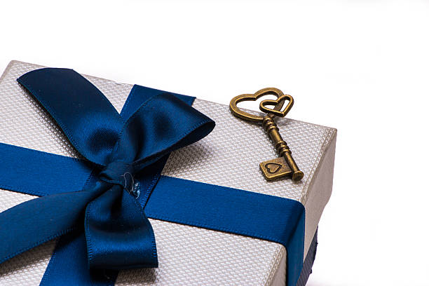 istock gift box and vintage key 506622327