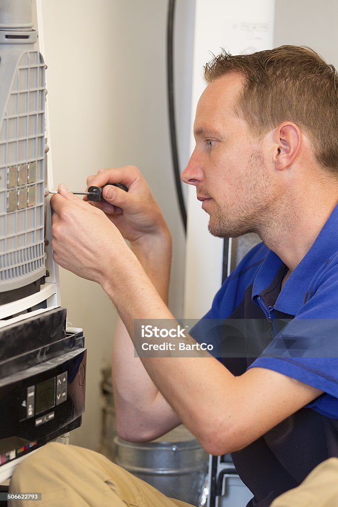 Klempner reparieren einem Ofen in-house - Lizenzfrei Boiler Stock-Foto