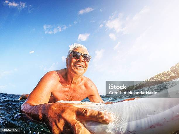 Feeling Young Stock Photo - Download Image Now - Senior Adult, Surfing, 60-69 Years