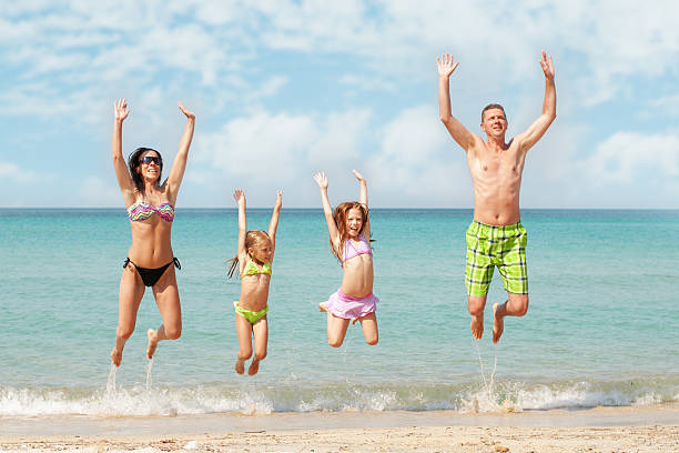 istock Family at the beach 506623153