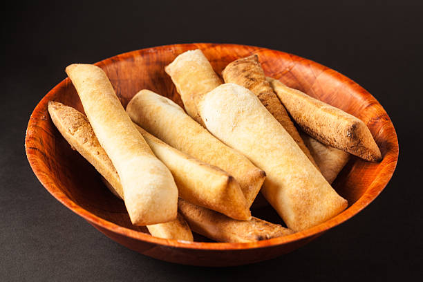 istock Fresh Brick Oven Pizza Dough Bread Sticks 506623245