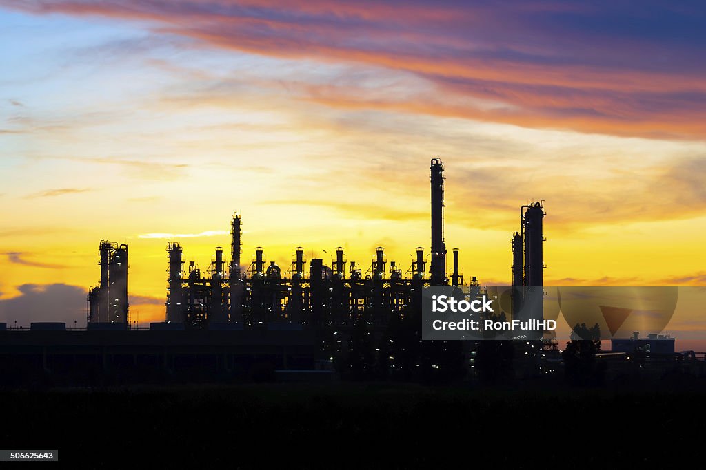 power plant Silhouette of power plant with sunset background. Air Pollution Stock Photo