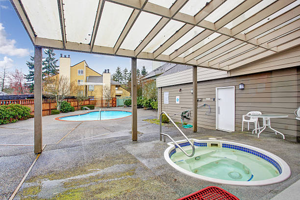 istock Backyard with swimming pool and hot tub 506627197