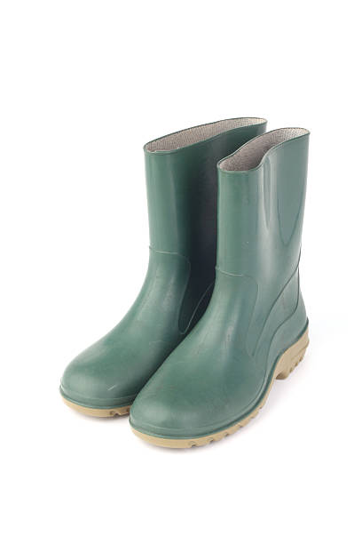 istock studio shot of a green rubber boots isolated on white 506650113