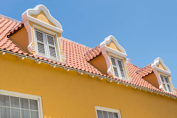 istock Dutch window and red tiled roof 506650417
