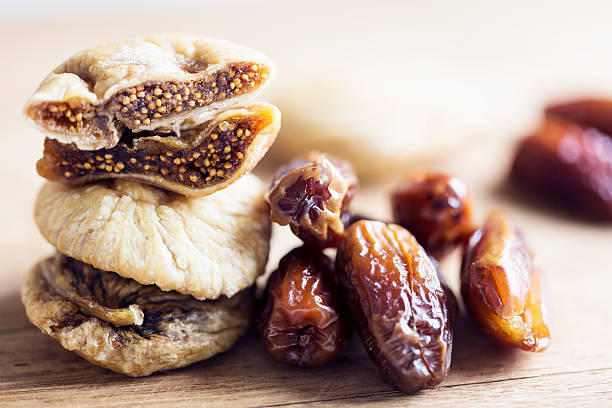 dried fruit on wooden background