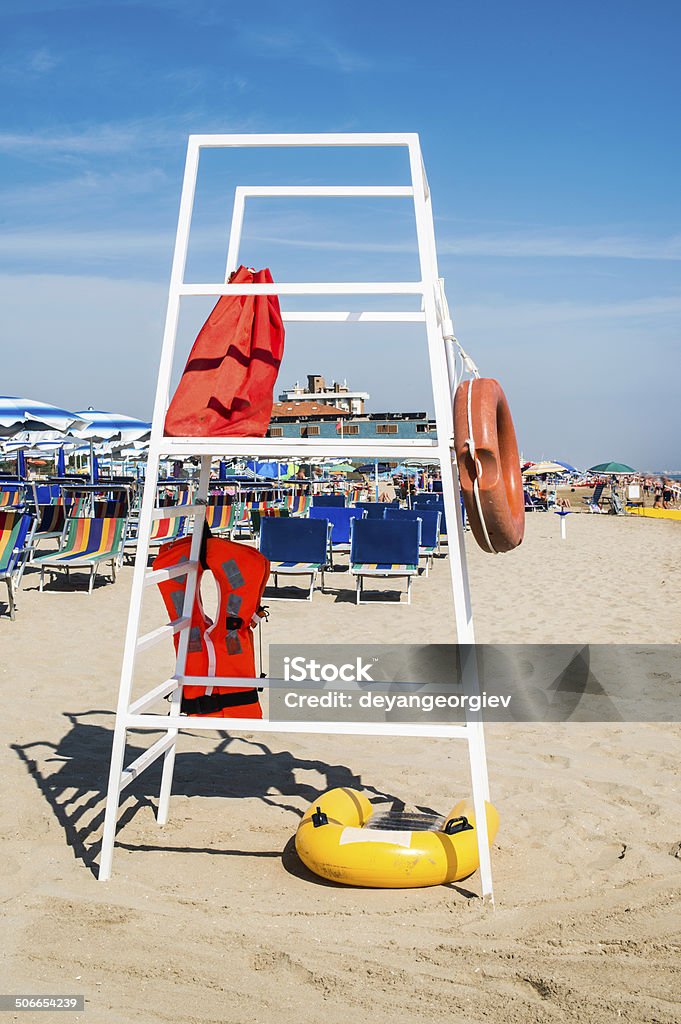 Safety equipment on the beach Safety equipment on the beach.Life jacket and belt Assistance Stock Photo