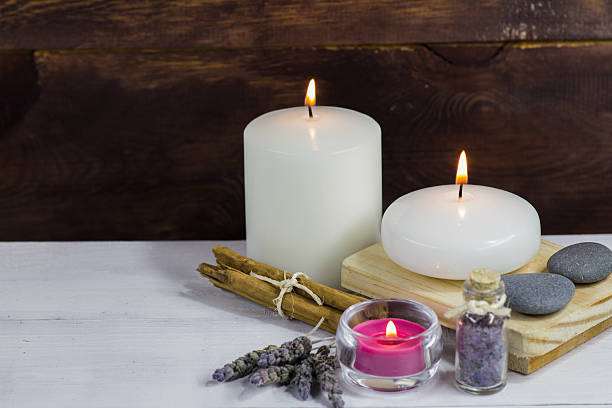 istock White Candles Spa, lavender bath salts and cinnamon 506662172