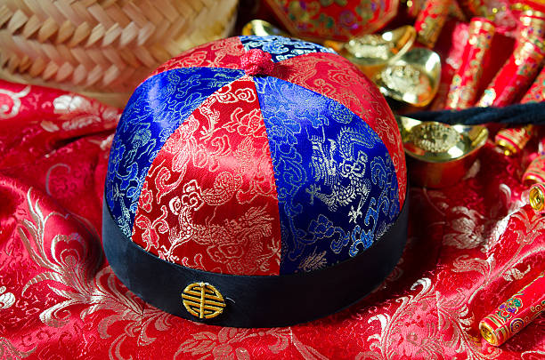 istock chinese new year hat with decorations on the background 506662840