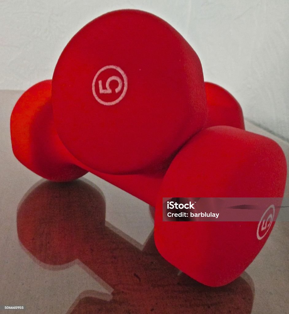 Weights Small five pound weights. Anaerobic Exercise Stock Photo