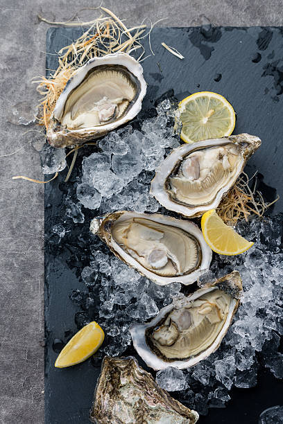 istock Oysters on the ice and lemon 506666574