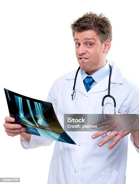 Expressive Doctor Examining Broken Foot Xray Stock Photo - Download Image Now - Adult, Bone Fracture, Cheerful