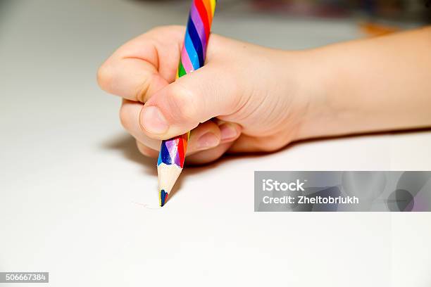 Kids Rigth Hand Holding A Pencil On Over White Stock Photo - Download Image Now - Color Image, Coloring, Colors